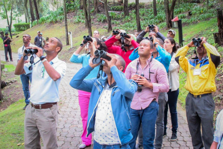 Participants learning how to use their new Vortex binoculars. (Photo by Beny Wilson)