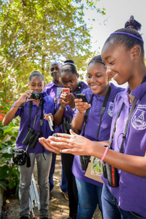 DeCarteret College Students release a bird. (Photo by Lisa Sorenson)