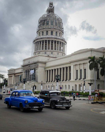 Capital and old cars in Havana. (Photo by Margaret Kinnaird)