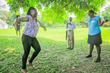 "Migratory bird" Sylvia Campbell from Brown's Town Primary School (left) attempts to fly round "high tension wire" Dionne Thompson of Epworth Primary School (right) in a bird migration re-enactment.