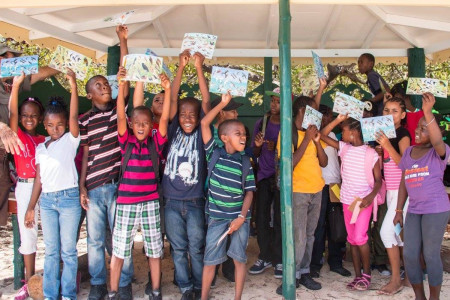 Hillsborough Government School show off their bird identification cards in the new Petite Carenage Turtle and Bird Sanctuary gazebo. (photo by Davon Baker)