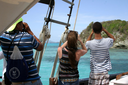 Juliana Coffey identifying seabirds with participants from Carriacou. (photo by Aly DeGraff)