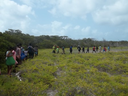 Birding trainees from 4 primary schools enter the Bird Sanctuary of Petit Carnage. (photo by Marina Fastigi)