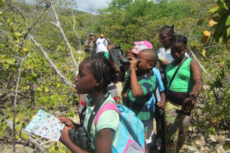 Mount Pleasant group, a brilliant lot instructed by teacher Mr. Matheson, spot birds in the Petit Caranage wetland. (photo by Marina Fastigi)