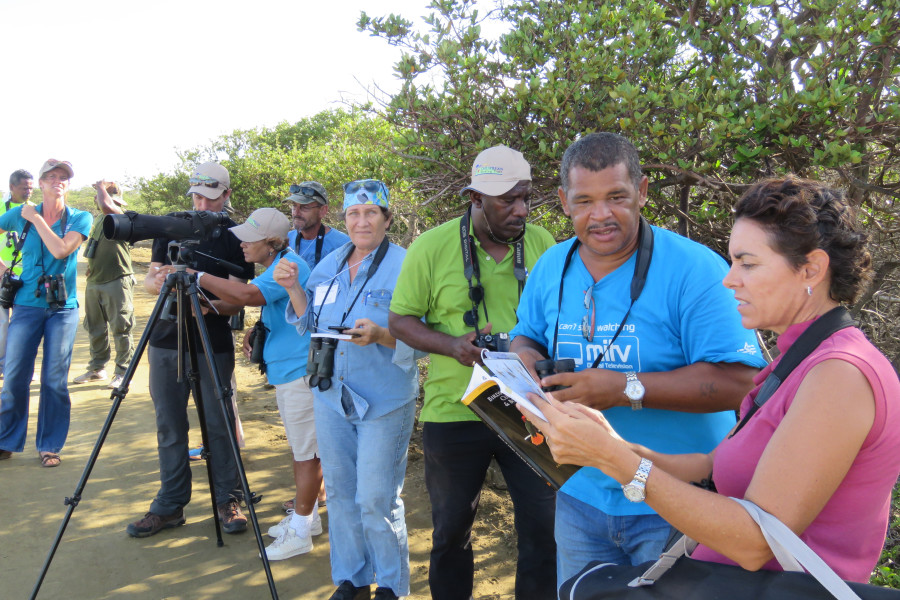 Learning to identify birds in the field. The diversity of participants matched the diversity of birds. (photo by Lisa Sorenson)