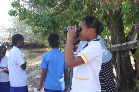 Port Royal Primary School students in Jamaica learned how to use binoculars for a field trip to view seabirds. (Photo by Ava Tomlinson, NEPA - Jamaica)