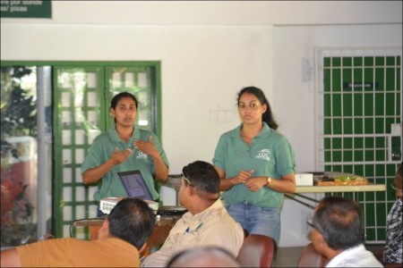 Kareena Anderson and Laura Baboolal CLiC “Team Traffic” members giving a presentation to enforcement personnel of the Wildlife Section, Trinidad and Tobago. (Photo by Praimchand Anderson)