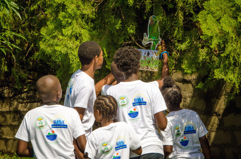 Young "bird sleuths" in Jamaica play the Bird Detective Game (Lesson 8) in BirdSleuth Caribbean curriculum. (photo courtesy of Jamaica Environment Trust).