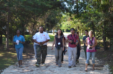 Workshop participants and faciliators enjoying a birding walk at The Retreat, Bahamas National Trust, Nassau, Bahamas.