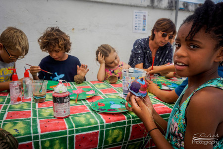 On St. Martin, festival attendees painted bird feeders to bring home. (Photo by Tim Chin)
