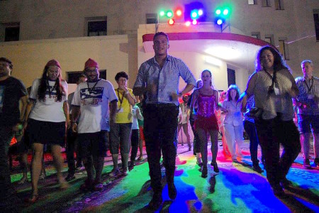 Learning how to salsa at the welcome reception. (Photo by Arnaldo Toledo)