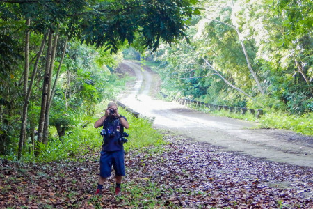 Our tour guide taking multiple photos with multiple cameras. 