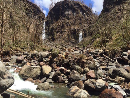 Normally lush and green, Trafalger Falls in Dominica, the nature isle, suffered serious damage to natural areas from Hurricane Maria (photo by Mark Lopez)