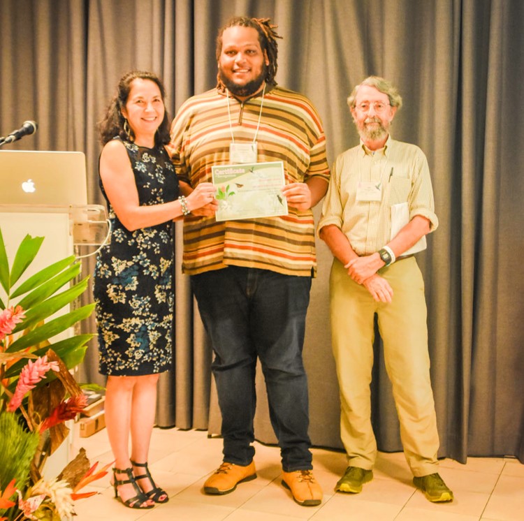 Christopher Cambrone takes home the Founders' Award for best student presentation, recognition that earns him a Lifetime Membership to BirdsCaribbean.