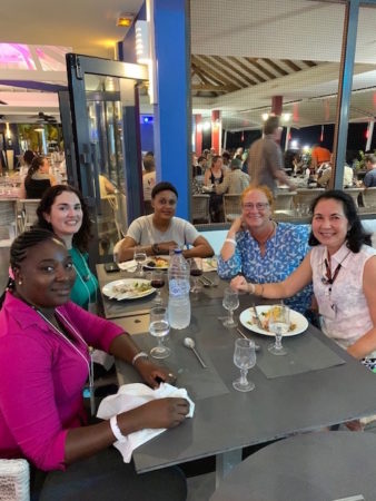 Mentors and mentees chat over dinner about careers in conservation - (left to right: Jeanette Victor (St. Lucia), Adrianne Tossas (Puerto Rico), Francoise Benjamin (Haiti), Jen Valiulis (US Virgin Islands), Lisa Sorenson (USA).
