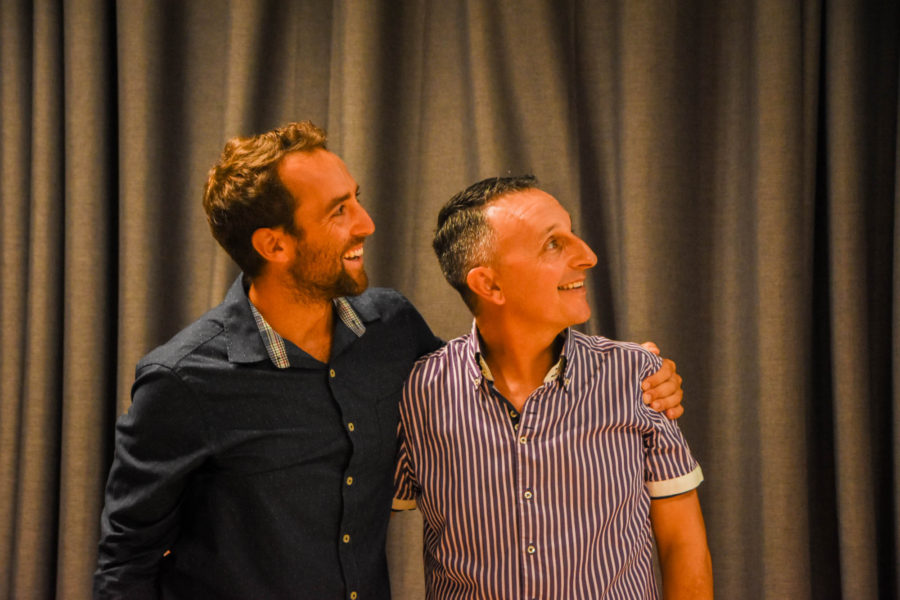 Anthony Levesque (right) looks up in surprise to see that he has won the President's Award for his nonstop work with birds and bird tourism on Guadeloupe.