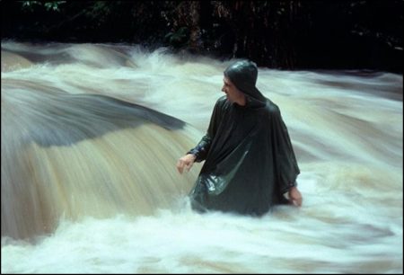 James (Jim) Wiiley crossing a raging river in Puerto Rico