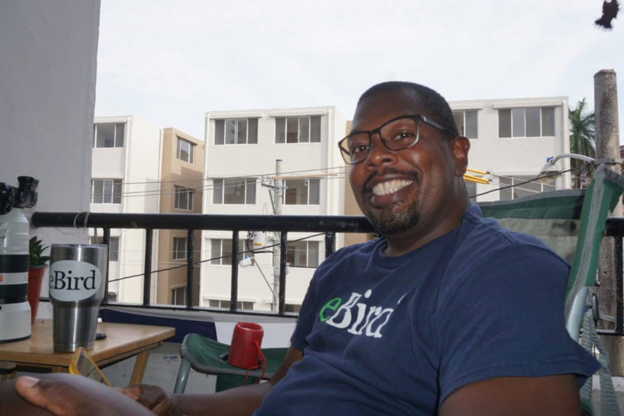 Beny on his balcony in eBird gear