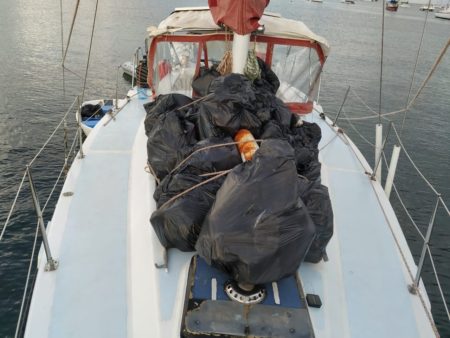 bags of trash collected from seabird colony
