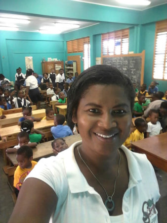 Presenter & children in classroom 