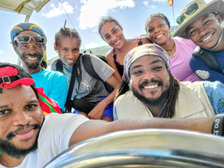 Team of Grenadian biologists on a boat conducting seabird surveys