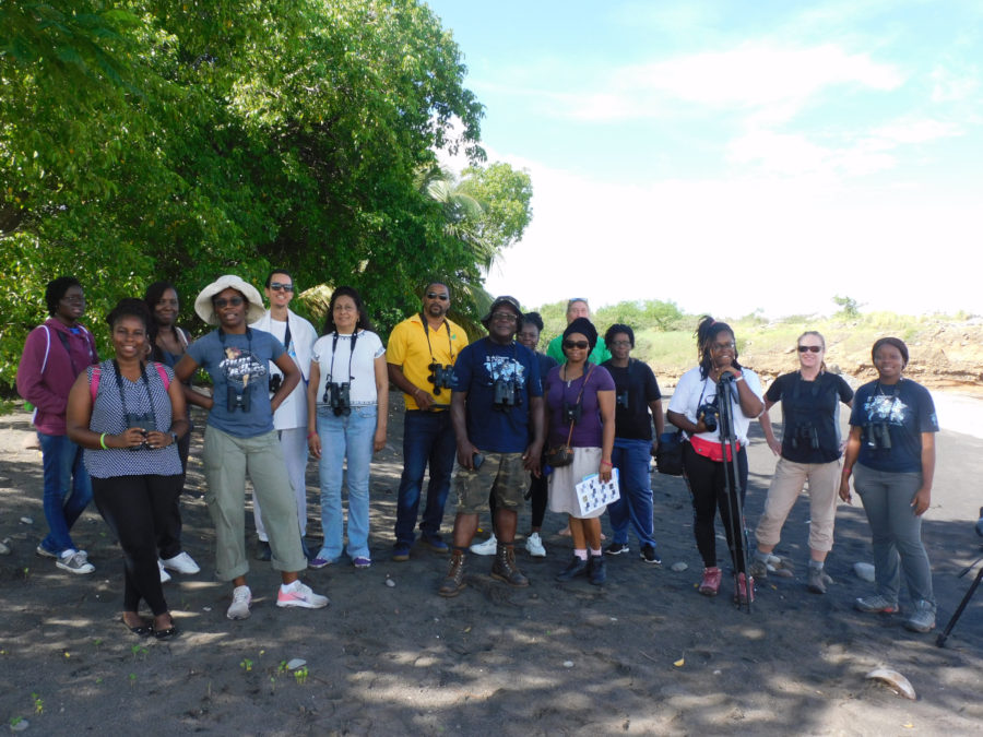 Ajhermae White and James ‘Scriber’ Daley with the participants of the first public shorebird outreach session.