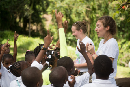 Hannah Carey (left) and Marie-Eve Cyr teach kids at the bird festival