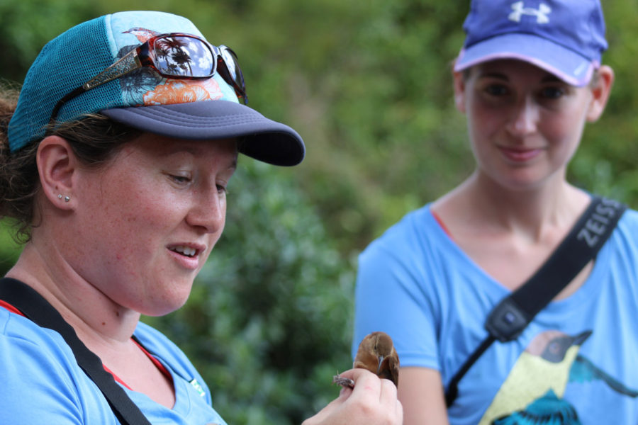 Kim Wetten and Lee Sutcliffe with a House Wren.