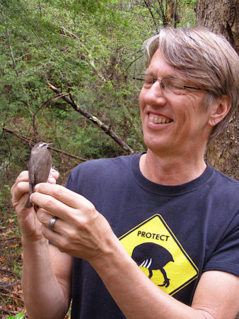 Steven Latta holding a banded Louisiana Waterthrush