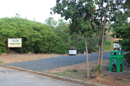 Area around Belmont Salt Pont Platform showing signs and garbage cans