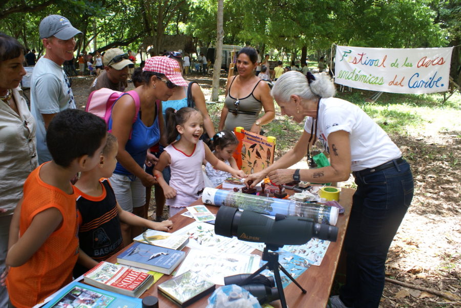 Dr. Lourdes Mugica and the Bird Ecology Group share educational materials on birds with the local community and children, Caribbean Endemic Bird Festival. 