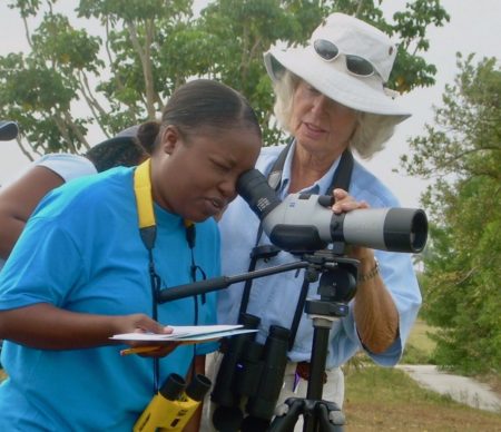 Erika birding with a young participant during the Grand-Bahama West Indian Whistling Duck workshop, March 2007.