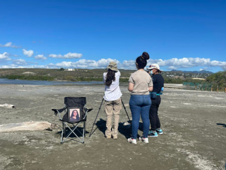 Birders with a photo of Shirley Droz