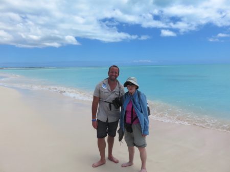 Ryan Chenery, Birding the Islands’ Lead Bird Guide, and client stop for a photo on the beach.