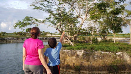 Grandmom and grandson enjoy birding in Puerto Rico. 