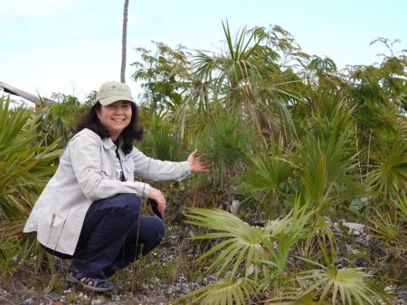 Lisa with young pine after 17 months of growth.