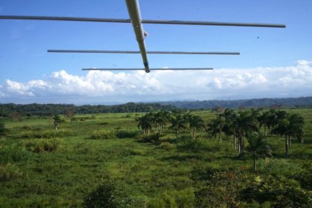 A yagi antenna (5-element, 166 Mhz) at Hacienda La Esperanza points over the restored sugarcane field toward the karst forests.
