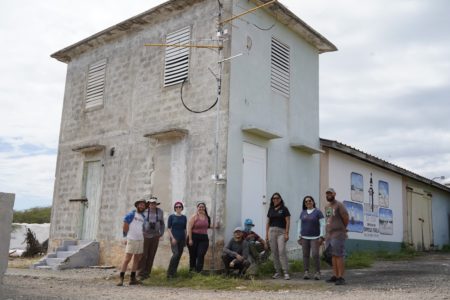 Most of the installation team next to the complete Motus station at Cabo Rojo. From left to right: Todd Alleger, Kendrick Weeks, Mallory Sarver, Maya Wilson, Aaron Coolman, Jedai Diaz, Ivelisse Rodrigues, Sheylda Diaz, and Cesar Montero.