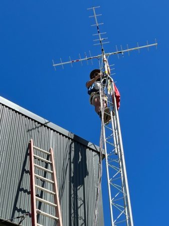 Todd Alleger attached the 434 Mhz antennas to the top of the tower.