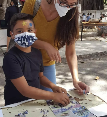 Student builds a bird puzzle as part of the CEBF activities in Cuba.