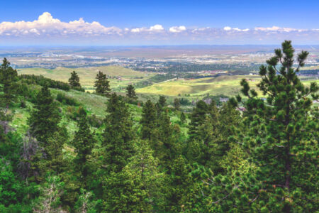 View of verdant hills and plains in Wyoming, from Casper Mountain.