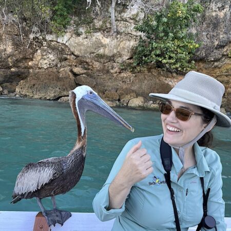 Brown Pelican on boat with Adrianne Tossas