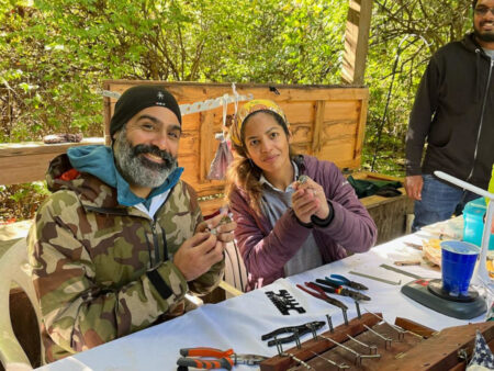 Dayamiris and her husband Omar band birds at WTC.