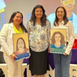 Adrianne Tossas with fellow award recipient and woman in science Brenda Ramos during the event.