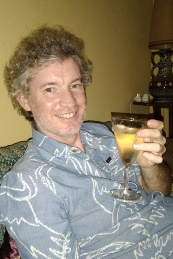 Man holding a glass of wine