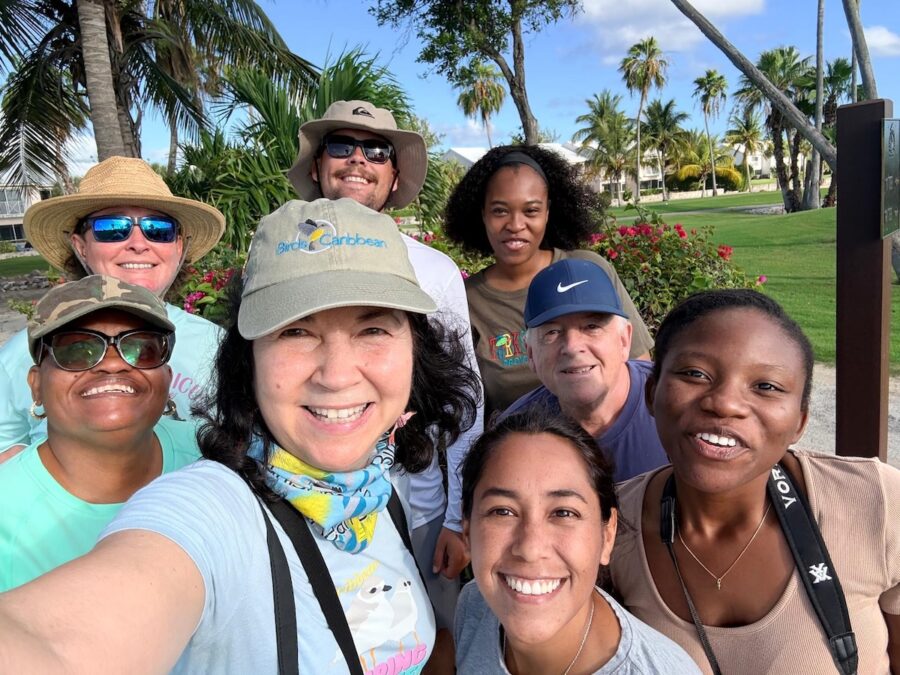 Selfie of group of people on a gold course. 