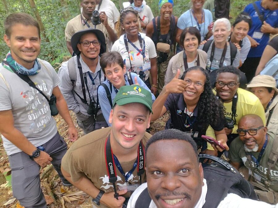 Group selfie of birders on a trail.