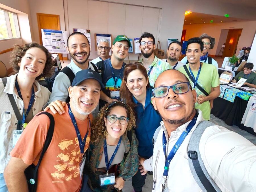 Group selfie of delegates at the conference.